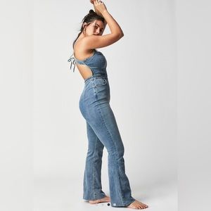 NWT Free people one piece denim romper. Size 6 Curvy 2nd ave boot cut.